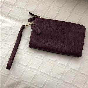 Coach wristlet color- plum